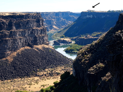 [A small dirt ramp sits on the south side of the canyon wall just upstream of Pillar Falls.]